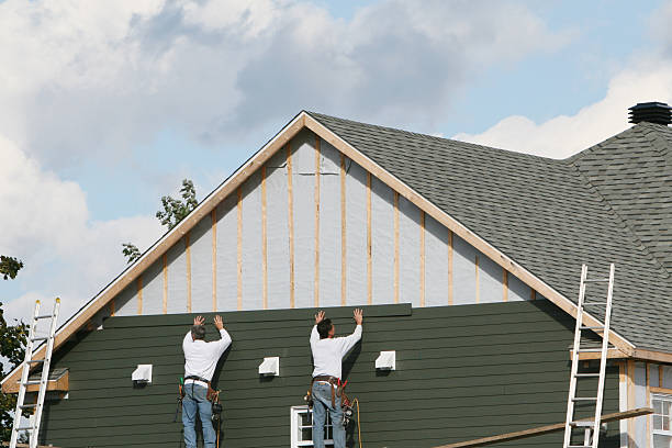 Professional Storm Damage Siding Repair technician working in Hopwood, PA